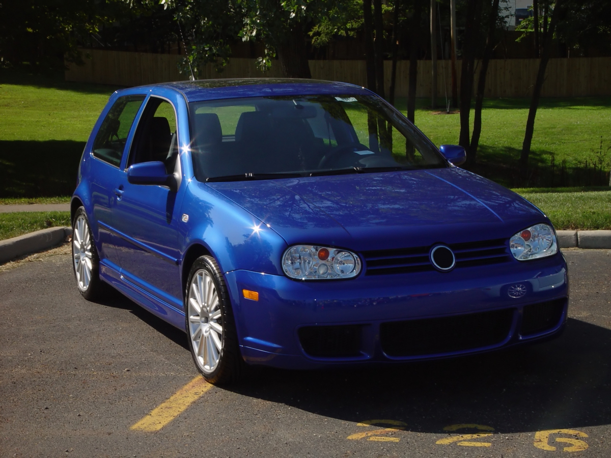 Blue VW in a Parking Lot