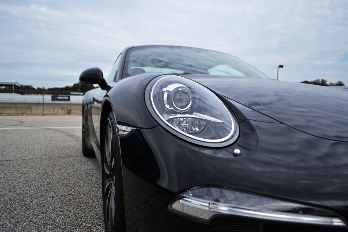 Black Porsche Headlight Closeup