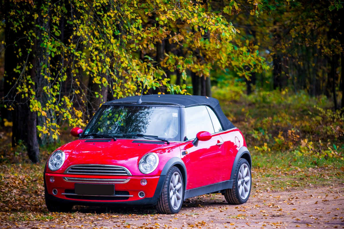 Red Mini Cooper on a Dirt Road