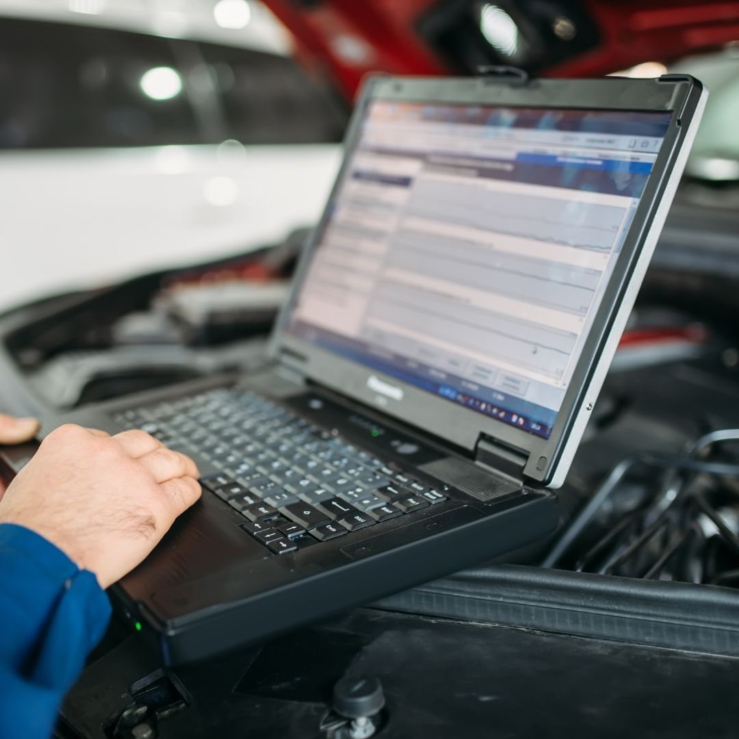 mechanic using laptop