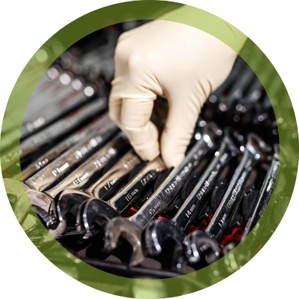 a person reaching for a wrench