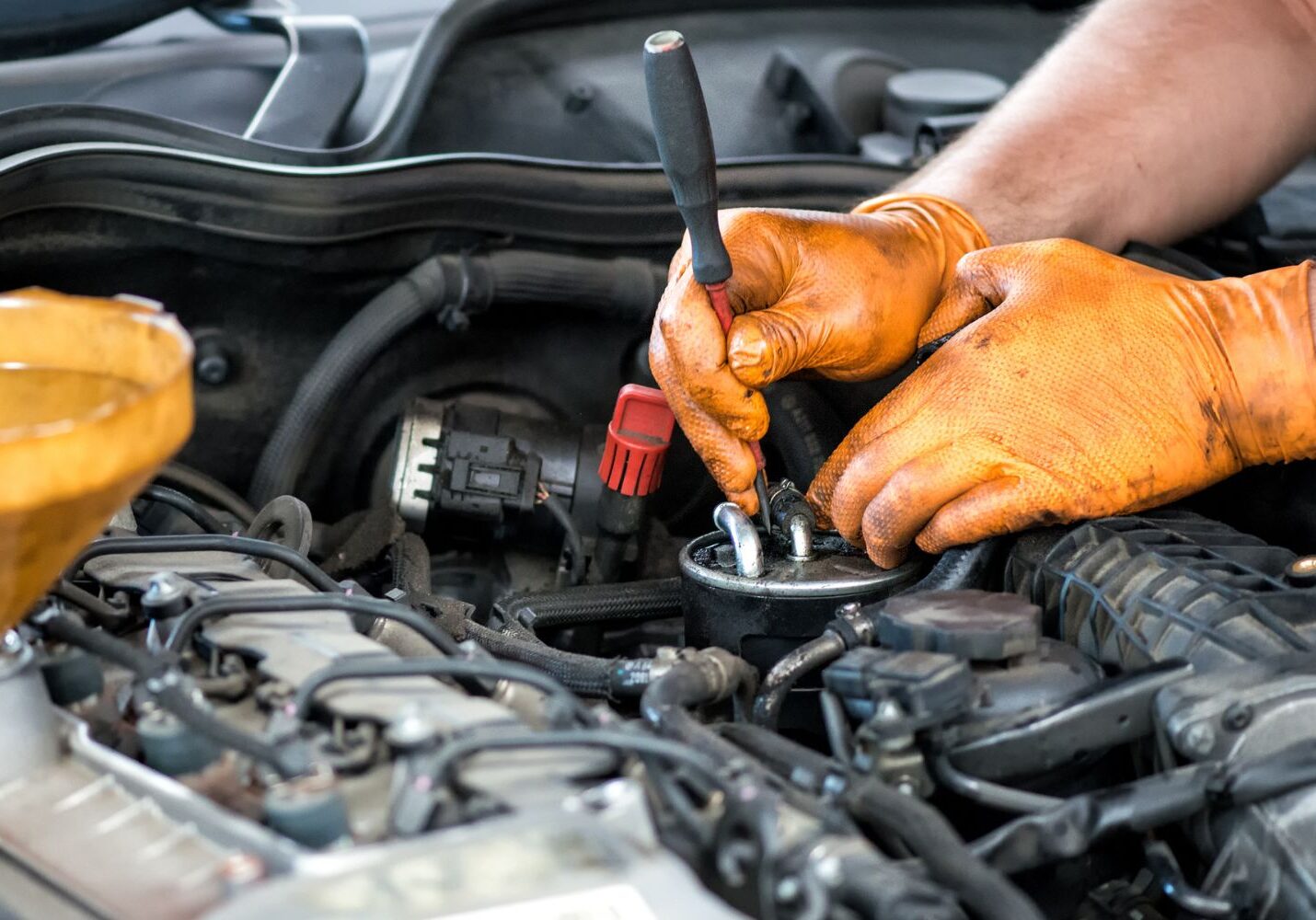 mechanic working on a diesel engine