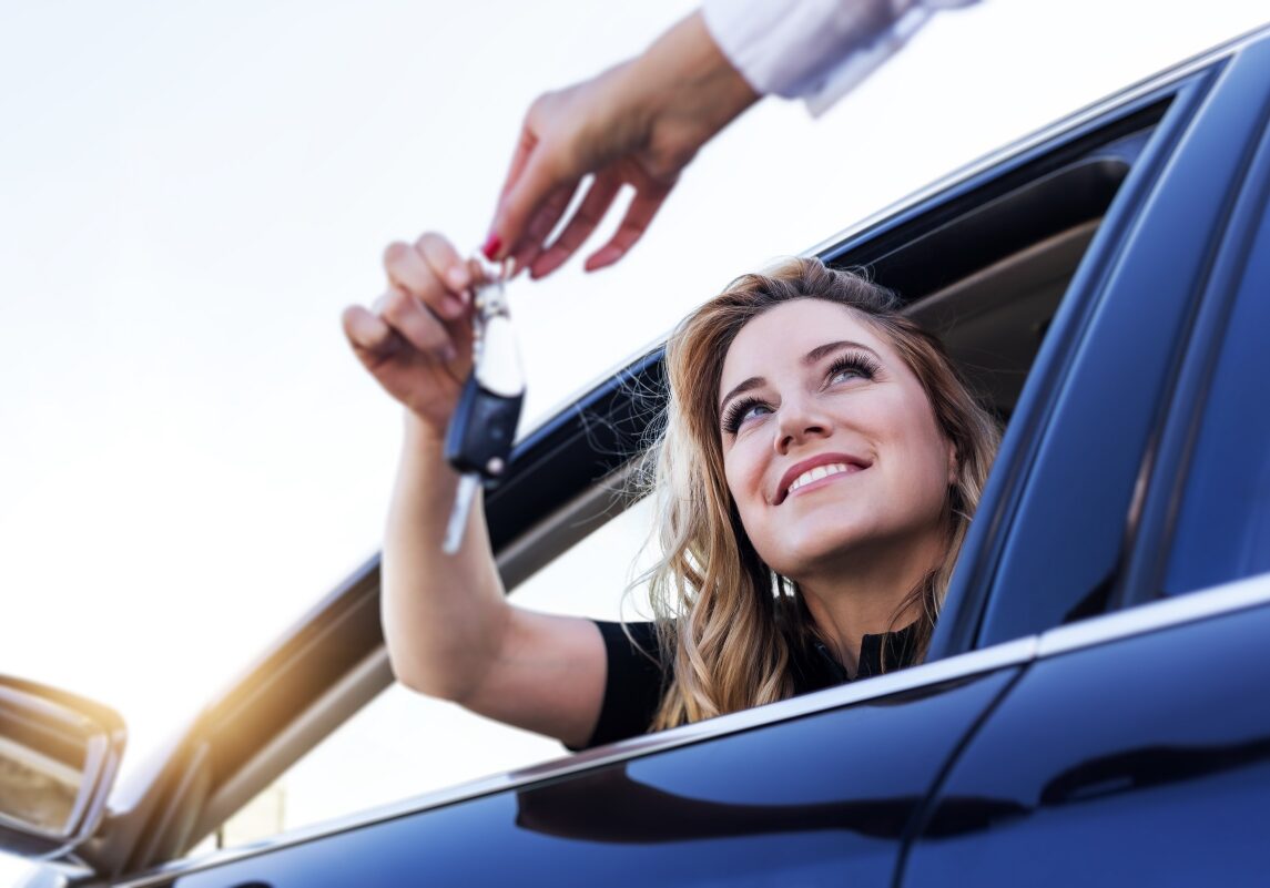 Handing the Keys to a New Car Owner