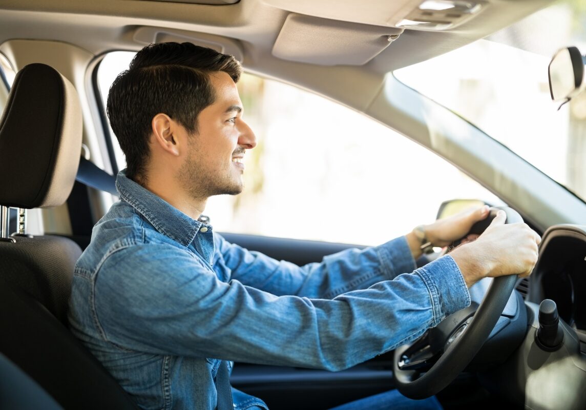 Driver Smiling at the Wheel