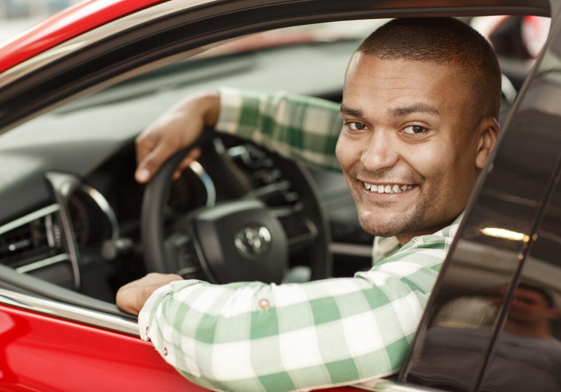 Happy Driver at the Wheel