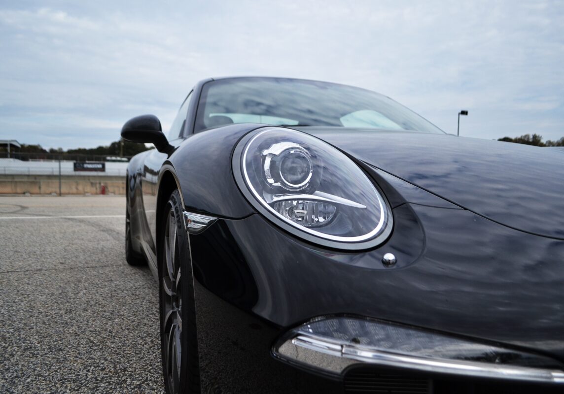 Black Porsche Headlight Closeup