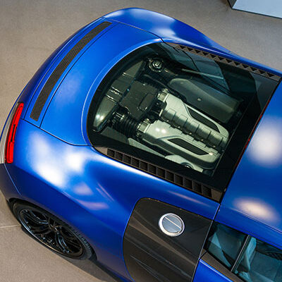 Blue Sports Car With Rear Engine