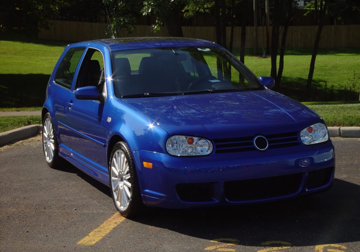 Blue VW in a Parking Lot